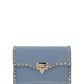 Small Rockstud Grainy Calfskin Crossbody Bag - Niagara.