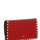 Rockstud Grainy Calfskin Chain Pouch - Red