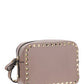 Small Rockstud Crossbody Bag in Grainy Calfskin Leather - Poudre