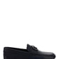 VLogo Signature Driving Shoe in Grainy Calfskin Leather - Black.