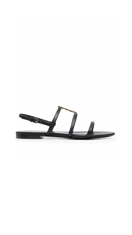 Cassandra Flat Sandals In Smooth Leather With Gold-Tone Monogram - Black