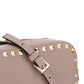 Small Rockstud Crossbody Bag in Grainy Calfskin Leather - Poudre