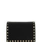 Rockstud Grainy Calfskin Chain Pouch - Black.