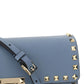 Small Rockstud Grainy Calfskin Crossbody Bag - Niagara.