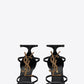 Cassandra Sandals in Smooth Leather with Gold-toned Monogram - Black