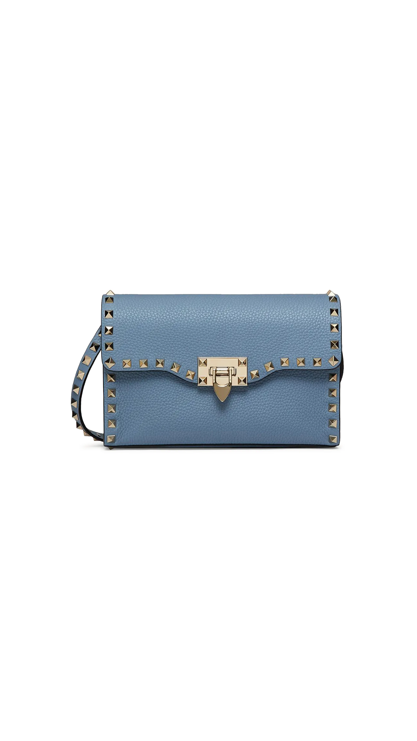 Small Rockstud Grainy Calfskin Crossbody Bag - Niagara.